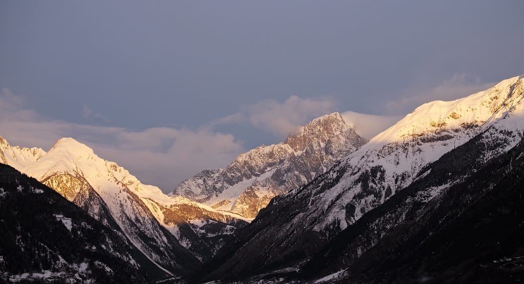 Alpenglow on a high ridge of the Mont Blanc massif