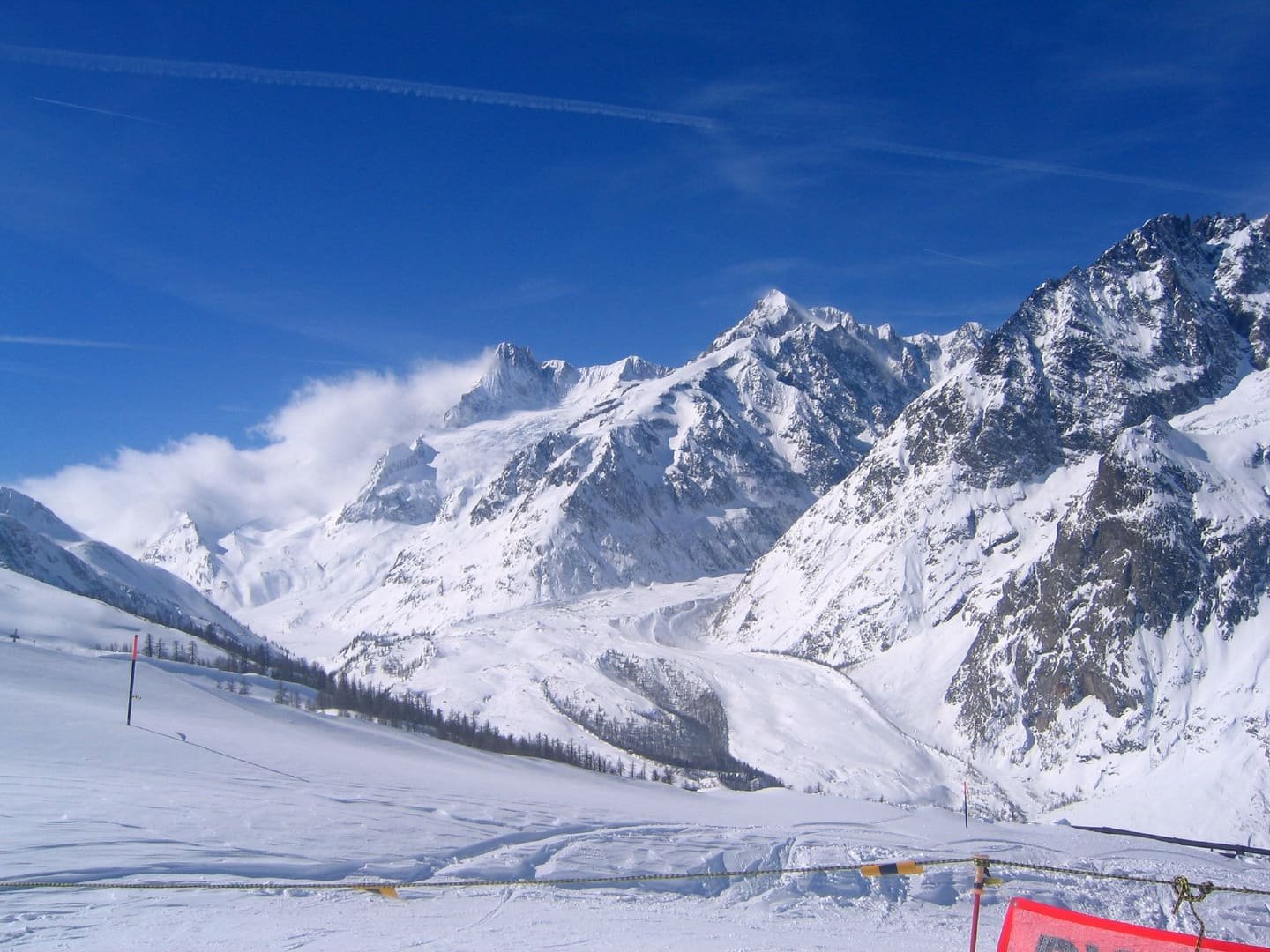The snow-covered Mont Blanc massif seen from the Italian side